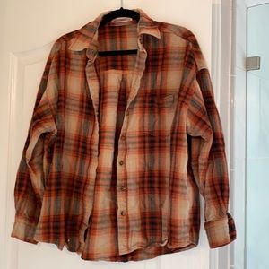 Orange, black and cream flannel top